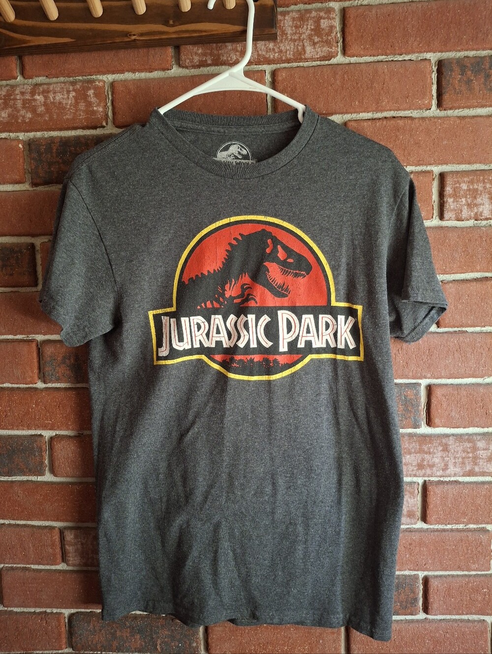 Jurassic Park Graphic Tee - Charcoal with Red & Yellow Logo